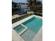 Inviting backyard pool and spa, ideal for relaxation and entertaining guests outdoors at 5006 W San Miguel St, Tampa, FL 33629