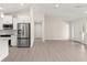 Modern kitchen with stainless steel appliances and island at 9171 Prospect Ave, Englewood, FL 34224