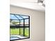 Bedroom with view of the pool and backyard at 9171 Prospect Ave, Englewood, FL 34224