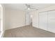 Well-lit bedroom with access to bathroom and ample closet space at 9171 Prospect Ave, Englewood, FL 34224
