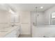 Bathroom featuring a large walk-in shower at 9171 Prospect Ave, Englewood, FL 34224