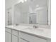 Bathroom boasts double vanity, quartz countertop and a shower at 2948 Forest Meadow Ave, Valrico, FL 33594