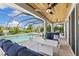 Enclosed pool area with spa and lounge furniture, offering a relaxing outdoor space at 7135 Graybrook Dr, Wesley Chapel, FL 33545