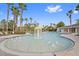 Community pool with water features and lounge chairs at 7135 Graybrook Dr, Wesley Chapel, FL 33545