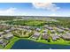Luxury home community with lake views and lush landscaping at 7135 Graybrook Dr, Wesley Chapel, FL 33545