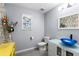 Unique bathroom with colorful accents and vessel sink at 7135 Graybrook Dr, Wesley Chapel, FL 33545
