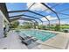 Relaxing screened pool and spa with plenty of room for outdoor enjoyment at 7135 Graybrook Dr, Wesley Chapel, FL 33545