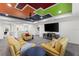 Game room with colorful ceiling and comfy seating at 7135 Graybrook Dr, Wesley Chapel, FL 33545