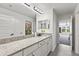 Clean bathroom with granite countertop and double sinks at 7135 Graybrook Dr, Wesley Chapel, FL 33545