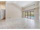 Bright living room area leading to an outdoor pool and screened-in patio at 3501 Country Creek Ln, Valrico, FL 33596