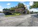 Another view of the building and parking area at 8693 Bardmoor Blvd # 308B, Seminole, FL 33777