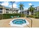 Relaxing community hot tub with seating area at 8693 Bardmoor Blvd # 308B, Seminole, FL 33777