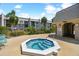 Community hot tub with surrounding patio furniture at 8693 Bardmoor Blvd # 308B, Seminole, FL 33777