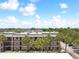 Complex of two story buildings with palm trees at 8693 Bardmoor Blvd # 308B, Seminole, FL 33777