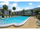 Inviting community pool area with lounge chairs and a relaxing atmosphere at 8693 Bardmoor Blvd # 308B, Seminole, FL 33777