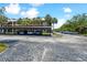Exterior view of the building and parking lot at 8693 Bardmoor Blvd # 308B, Seminole, FL 33777