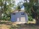 Two-story home featuring a garage, unfinished upper story, block construction, and a lawn at 510 Tighe Ave, Seffner, FL 33584
