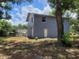 Two-story home featuring a garage, unfinished upper story, block construction, and a lawn at 510 Tighe Ave, Seffner, FL 33584
