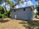 Two-story home featuring a garage, unfinished upper story, block construction, and a lawn at 510 Tighe Ave, Seffner, FL 33584