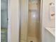 Clean shower stall with a glass door at 5353 Comanche St, Zephyrhills, FL 33542