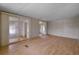 Living room with sliding glass doors at 5353 Comanche St, Zephyrhills, FL 33542