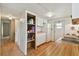 Kitchen with white cabinets and wood countertops at 5353 Comanche St, Zephyrhills, FL 33542