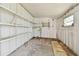 Empty storage room with metal shelving at 5353 Comanche St, Zephyrhills, FL 33542