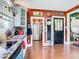 Kitchen features red walls, stainless steel appliances, and ample counter space at 510 Tighe Ave, Seffner, FL 33584
