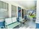 Inviting front porch with rocking chairs and vintage decor at 510 Tighe Ave, Seffner, FL 33584