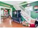 Living room with hardwood floors, staircase, and view into dining area at 510 Tighe Ave, Seffner, FL 33584