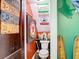 Small half bathroom with vintage decor and Texaco memorabilia at 510 Tighe Ave, Seffner, FL 33584