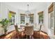Charming breakfast nook featuring a bay window, modern light fixture, and comfortable seating at 4108 W San Luis St, Tampa, FL 33629