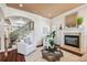 Inviting living room features a fireplace, staircase, and elegant decor at 4108 W San Luis St, Tampa, FL 33629