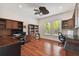 Home office with custom built-ins, hardwood floors, dual workstations and lots of natural light at 4108 W San Luis St, Tampa, FL 33629