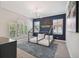 bedroom with twin beds, a nautical theme, and plenty of natural light at 5013 W Leona St, Tampa, FL 33629