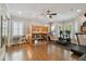 Home gym with sauna, exercise equipment, and hardwood floors at 5013 W Leona St, Tampa, FL 33629