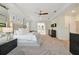 Main bedroom with king-size bed, ensuite bathroom access, and ample space at 5013 W Leona St, Tampa, FL 33629