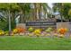 The Villages of Bayport community entrance with lush landscaping at 10426 La Mirage Ct, Tampa, FL 33615