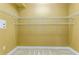Large walk-in closet with wire shelving at 10426 La Mirage Ct, Tampa, FL 33615