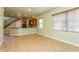 Kitchen features wood cabinets, breakfast bar, and tile floors at 10426 La Mirage Ct, Tampa, FL 33615