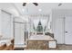 Bathroom with a walk-in shower and a separate soaking tub at 805 Woodcarver Ln, Brandon, FL 33510