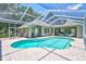 Escape to your private oasis with this inviting screened pool at 805 Woodcarver Ln, Brandon, FL 33510