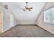 Large bonus room with vaulted ceiling and carpet at 805 Woodcarver Ln, Brandon, FL 33510