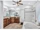 Large bathroom with a soaking tub, shower, and double vanity at 805 Woodcarver Ln, Brandon, FL 33510