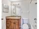 Clean bathroom with granite vanity and updated toilet at 805 Woodcarver Ln, Brandon, FL 33510