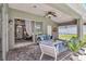 Relaxing patio with seating area and view of backyard at 805 Woodcarver Ln, Brandon, FL 33510