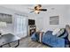 Cozy bedroom with ceiling fan and wood-look flooring at 805 Woodcarver Ln, Brandon, FL 33510