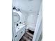 Clean bathroom with white vanity, marble countertop and a tub at 13042 Leverington St, Tampa, FL 33624