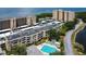 Condo building, parking, pool, and waterfront view at 2616 Cove Cay Dr # 506, Clearwater, FL 33760
