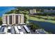 Aerial view of condo building near water at 2616 Cove Cay Dr # 506, Clearwater, FL 33760